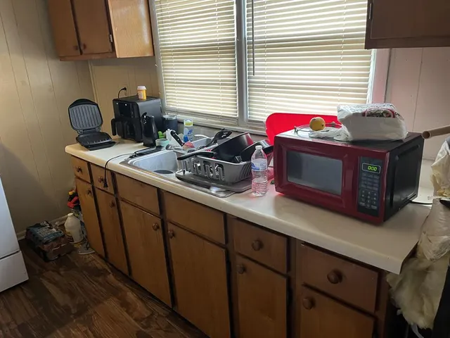 a kitchen with a stove and a sink