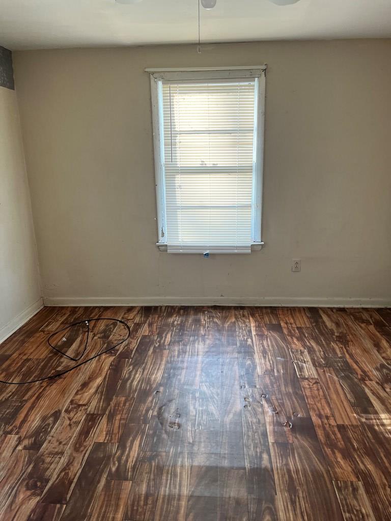 200 Hunt Circle, Unit 200 Manchester, GA 31816 - Photo 9 of 14 a view of a room with wooden floor and window