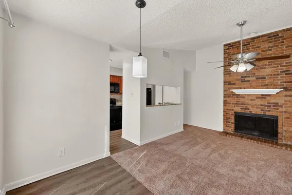 a view of a livingroom with a fireplace
