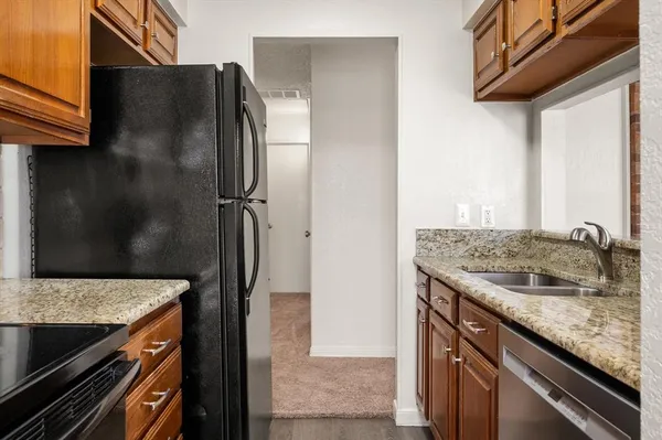 a view of a balcony with trees
