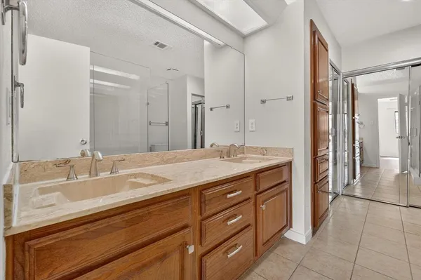 a bathroom with a shower and toilet