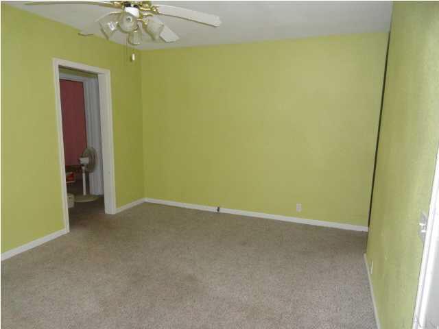 317 Bryant Road Pensacola, FL 32507 - Photo 2 of 16 Living Room From Front Door... Bedrooms to Left