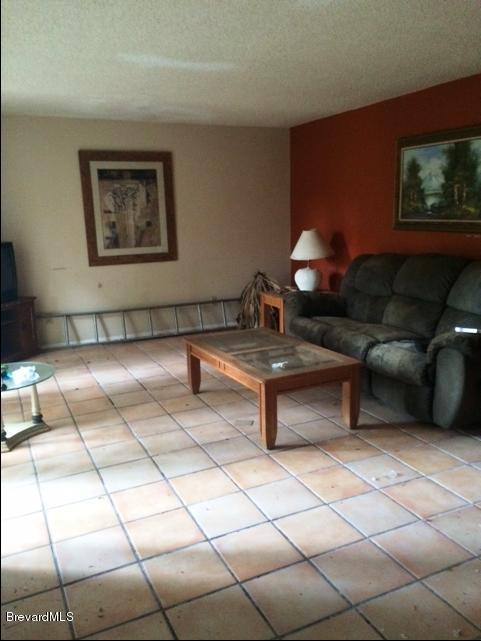3511 Ne Vista Palm Bay, FL 32905 - Photo 2 of 4 LIVING ROOM WITH TILE
