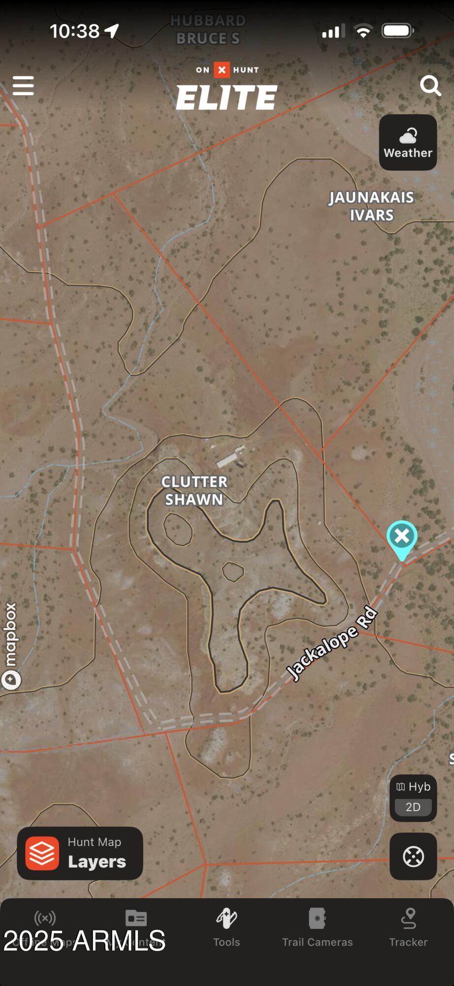 a view of water heater and car parked