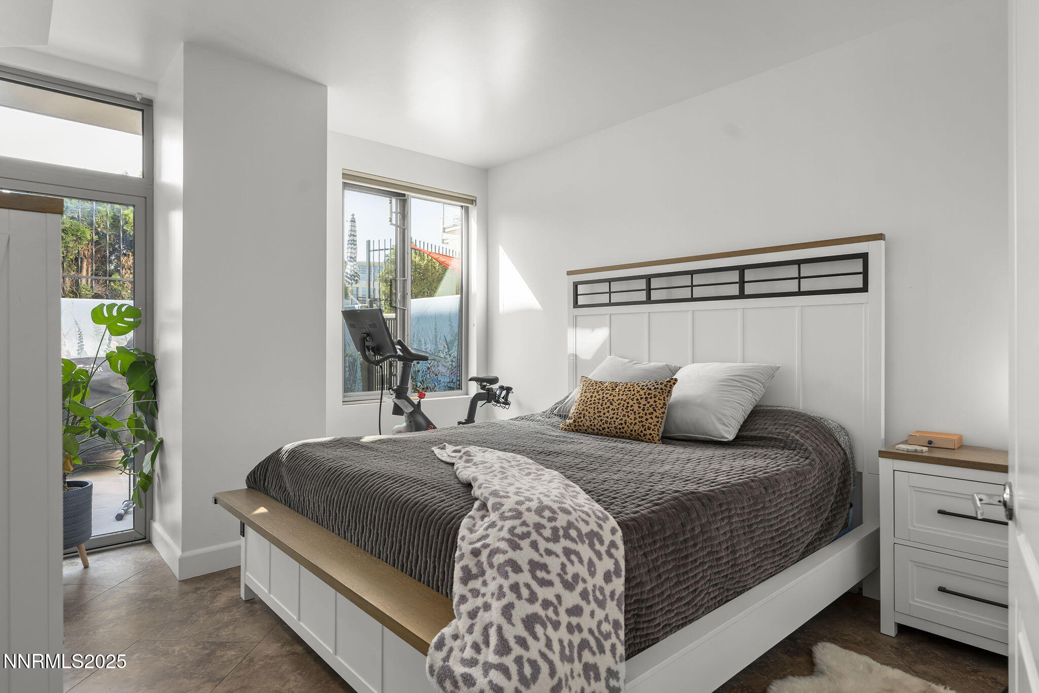 50 North Sierra Street, Unit 508 Reno, NV 89501 - Photo 16 of 27 a bedroom with a bed and a window