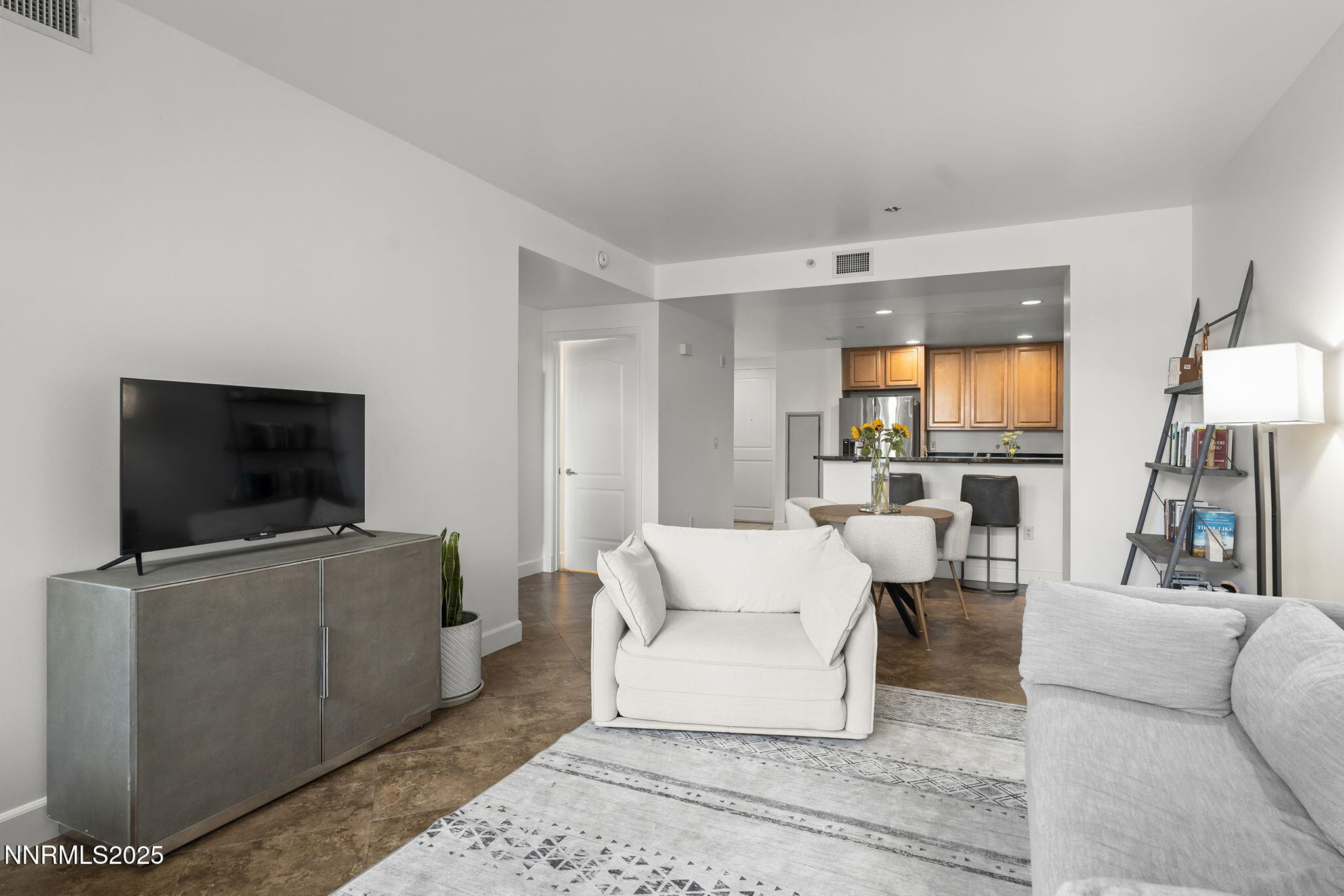 50 North Sierra Street, Unit 508 Reno, NV 89501 - Photo 9 of 27 a living room with furniture and a flat screen tv