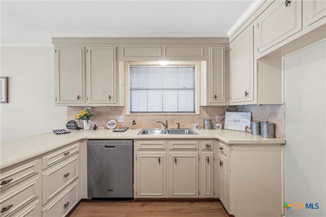 3601 Willow Bend Circle Waco, TX 76708 - Photo 11 of 37 a kitchen with a sink and cabinets