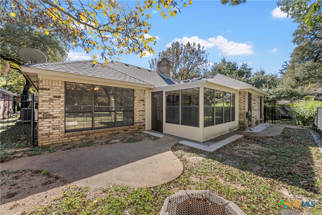 3601 Willow Bend Circle Waco, TX 76708 - Photo 32 of 37 a front view of a house with a yard and garage