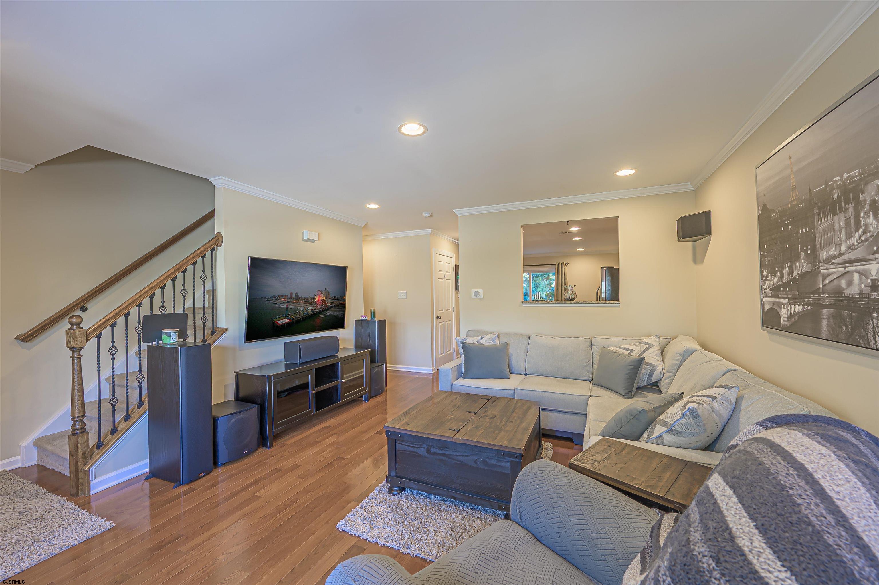22 Millstream Road, Unit 22 Clementon, NJ 08021 - Photo 11 of 28 a living room with furniture and a flat screen tv