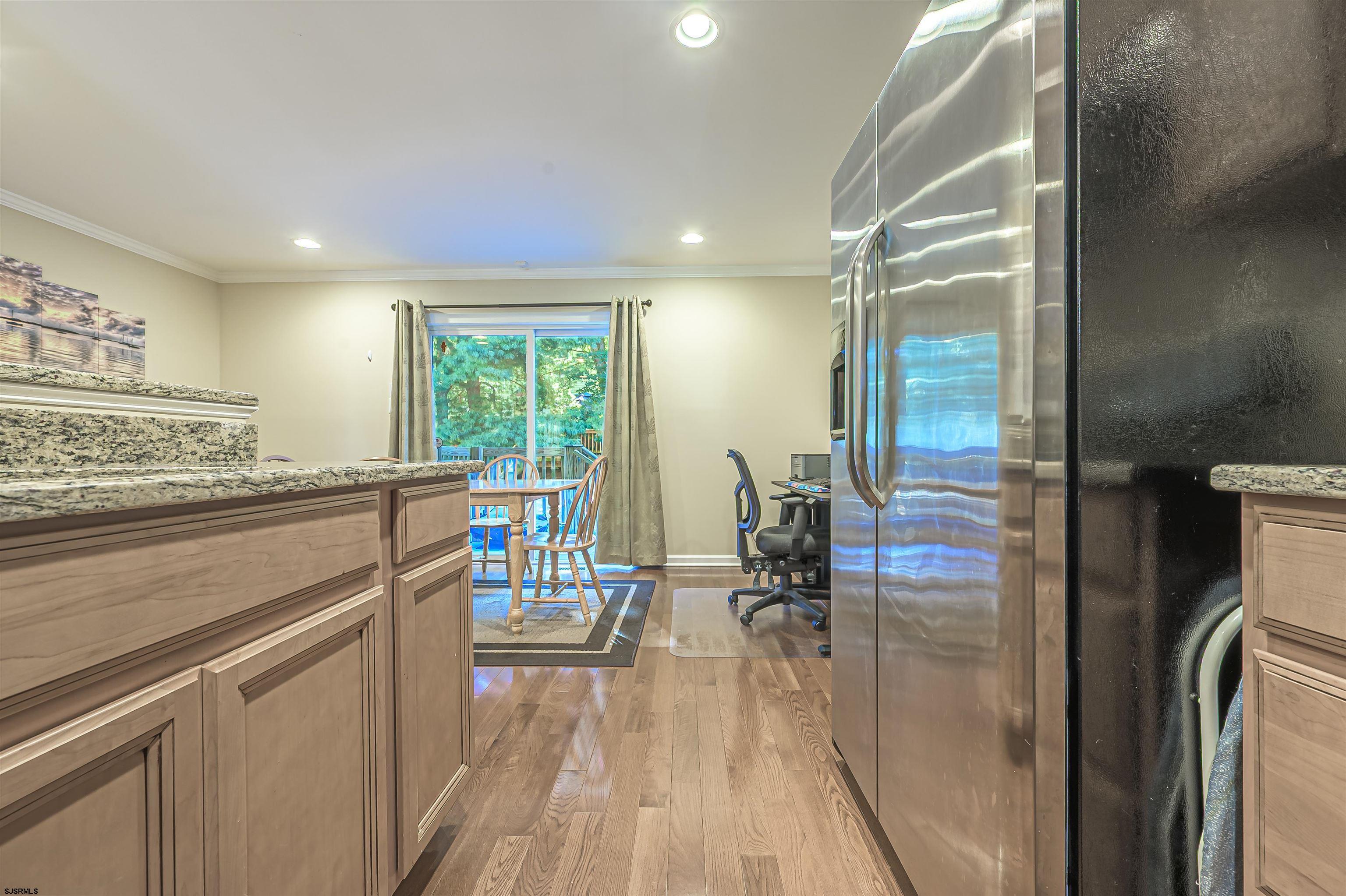 22 Millstream Road, Unit 22 Clementon, NJ 08021 - Photo 18 of 28 a view of a kitchen from the hallway