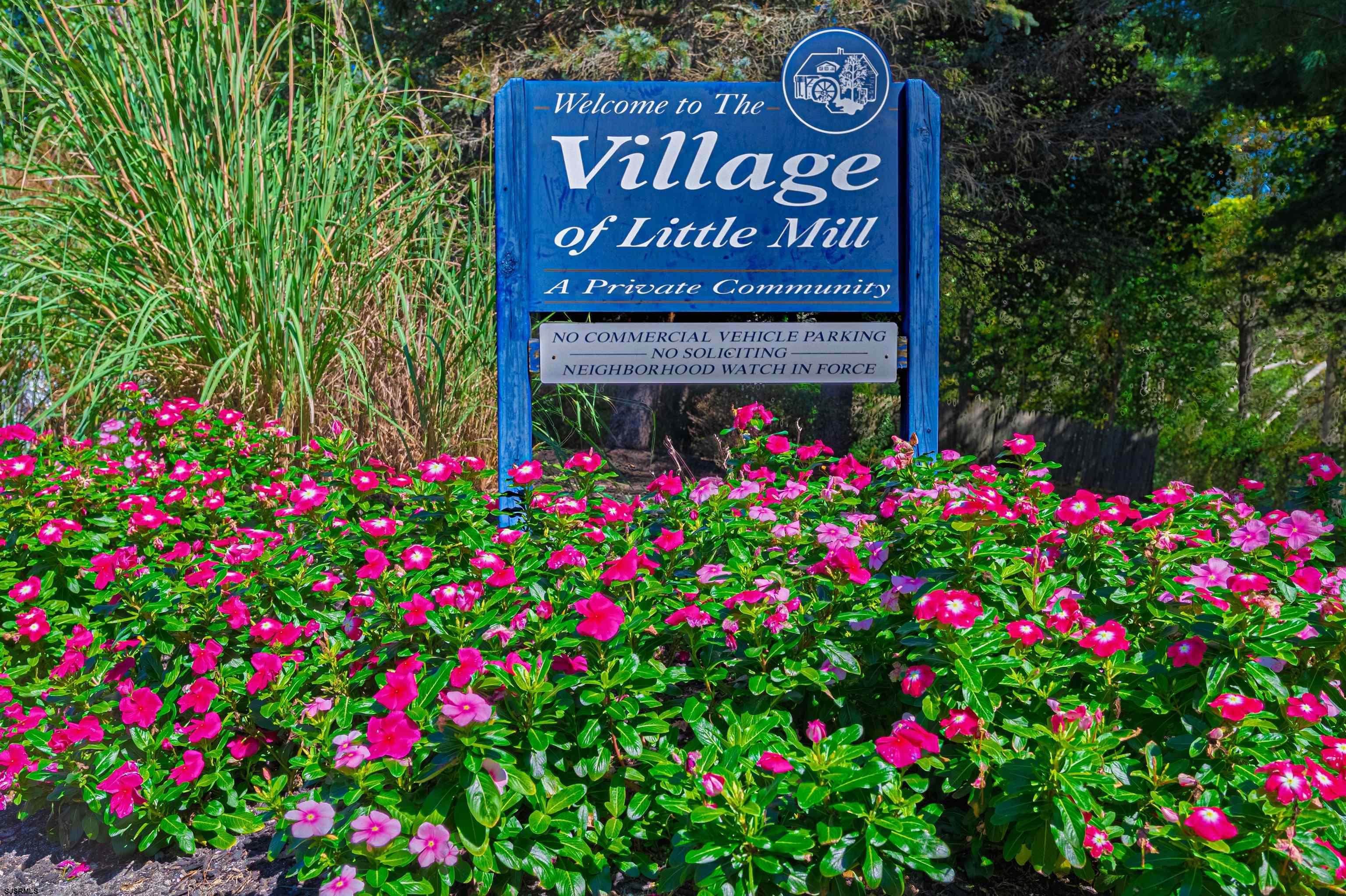 22 Millstream Road, Unit 22 Clementon, NJ 08021 - Photo 3 of 28 a sign that is in front of flowers