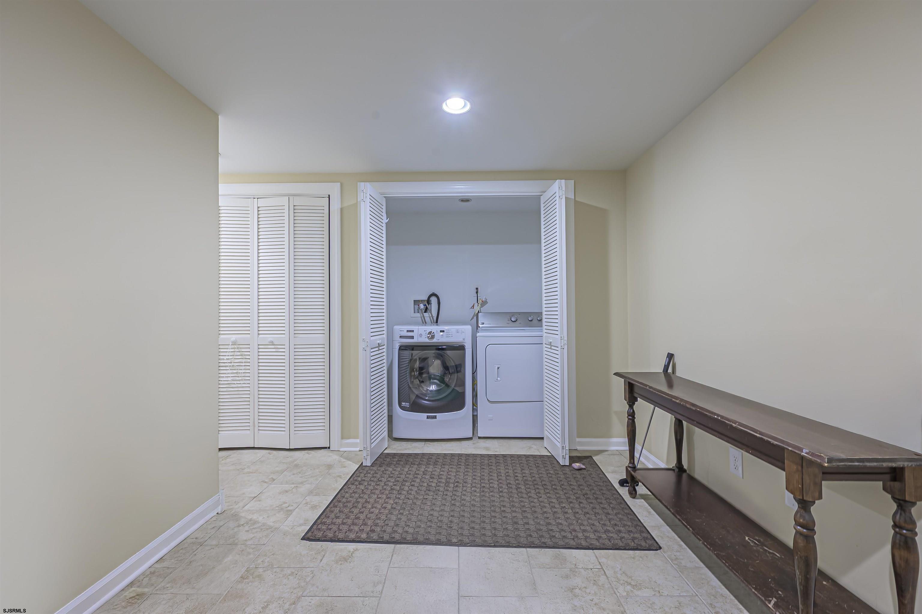 22 Millstream Road, Unit 22 Clementon, NJ 08021 - Photo 6 of 28 a view of a hallway with a kitchen