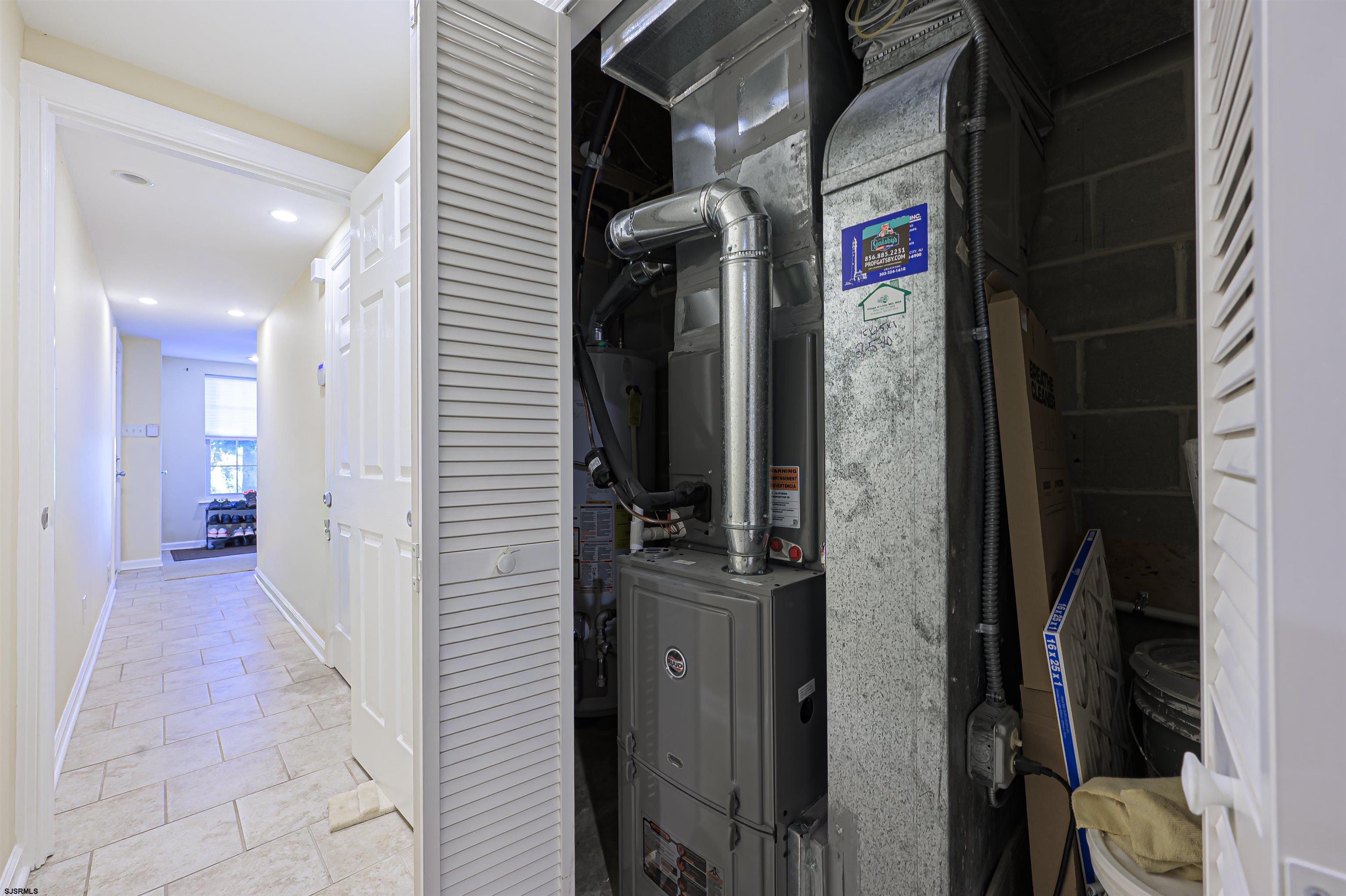 22 Millstream Road, Unit 22 Clementon, NJ 08021 - Photo 8 of 28 a view of a hallway with wooden shelves