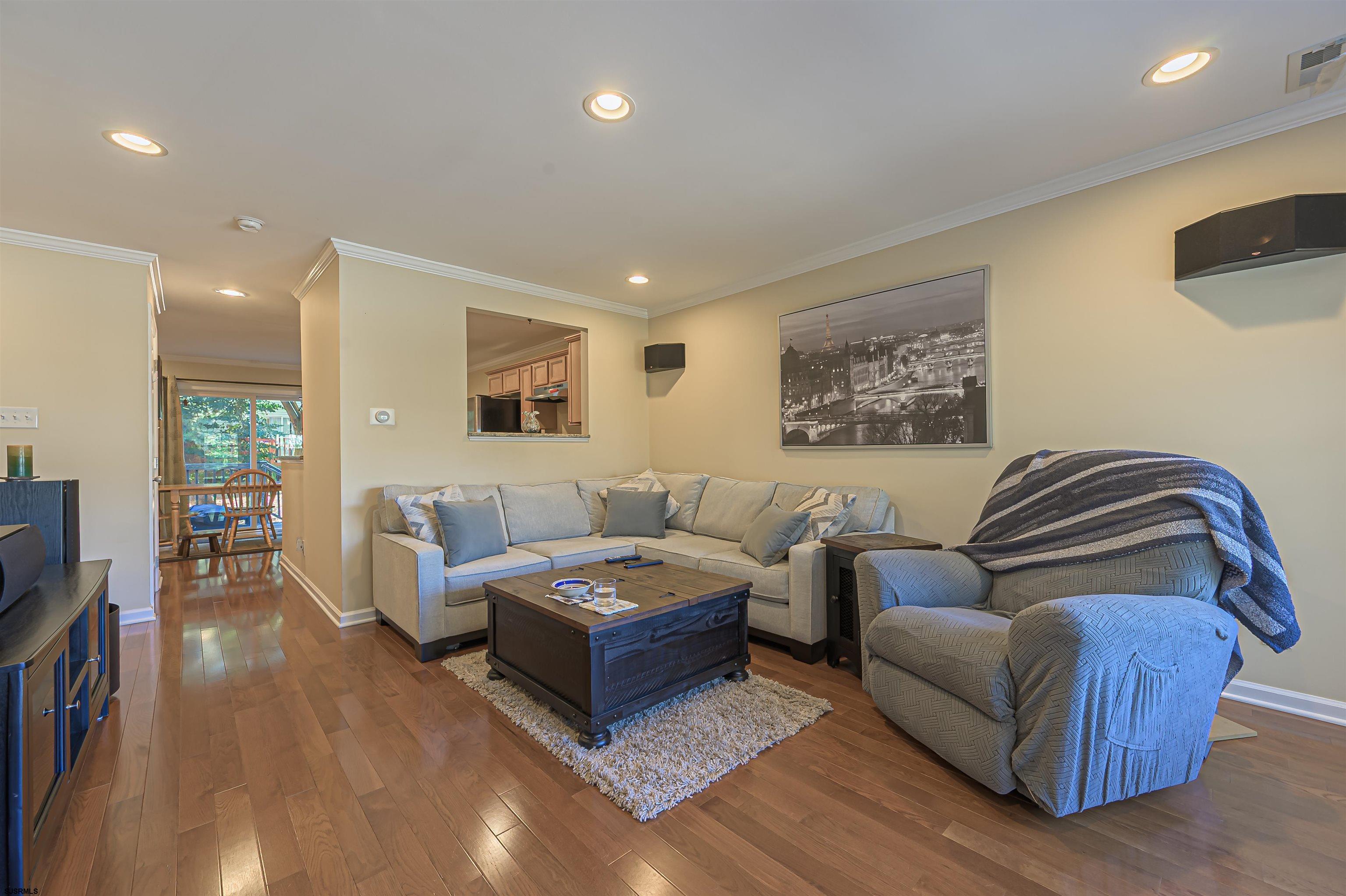 22 Millstream Road, Unit 22 Clementon, NJ 08021 - Photo 10 of 28 a living room with furniture and a flat screen tv