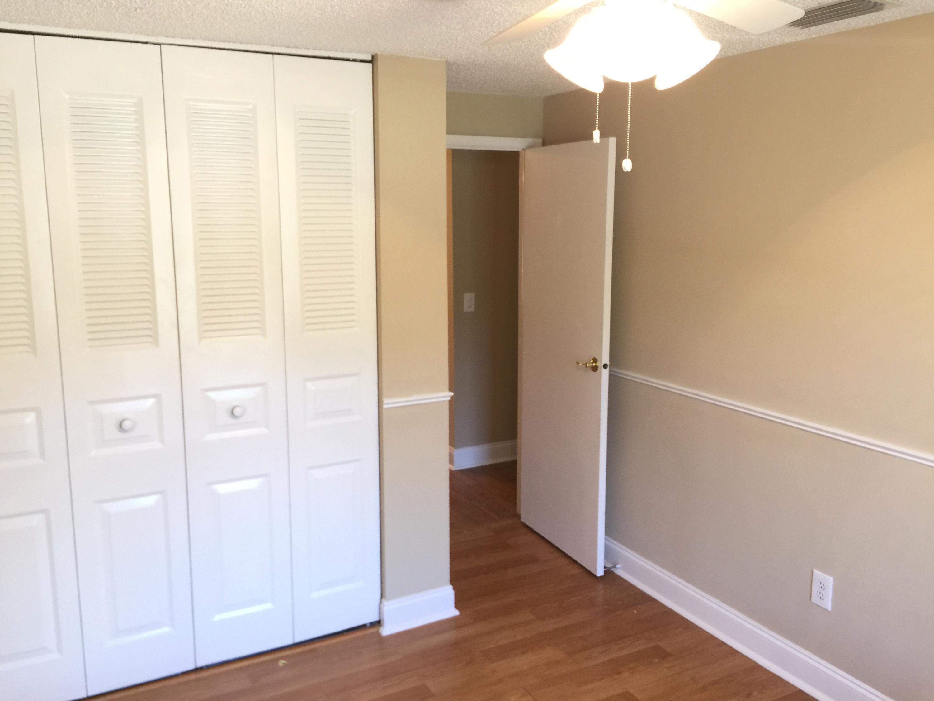 5266 Steven Road Boynton Beach, FL 33472 - Photo 15 of 26 an empty room with wooden floor
