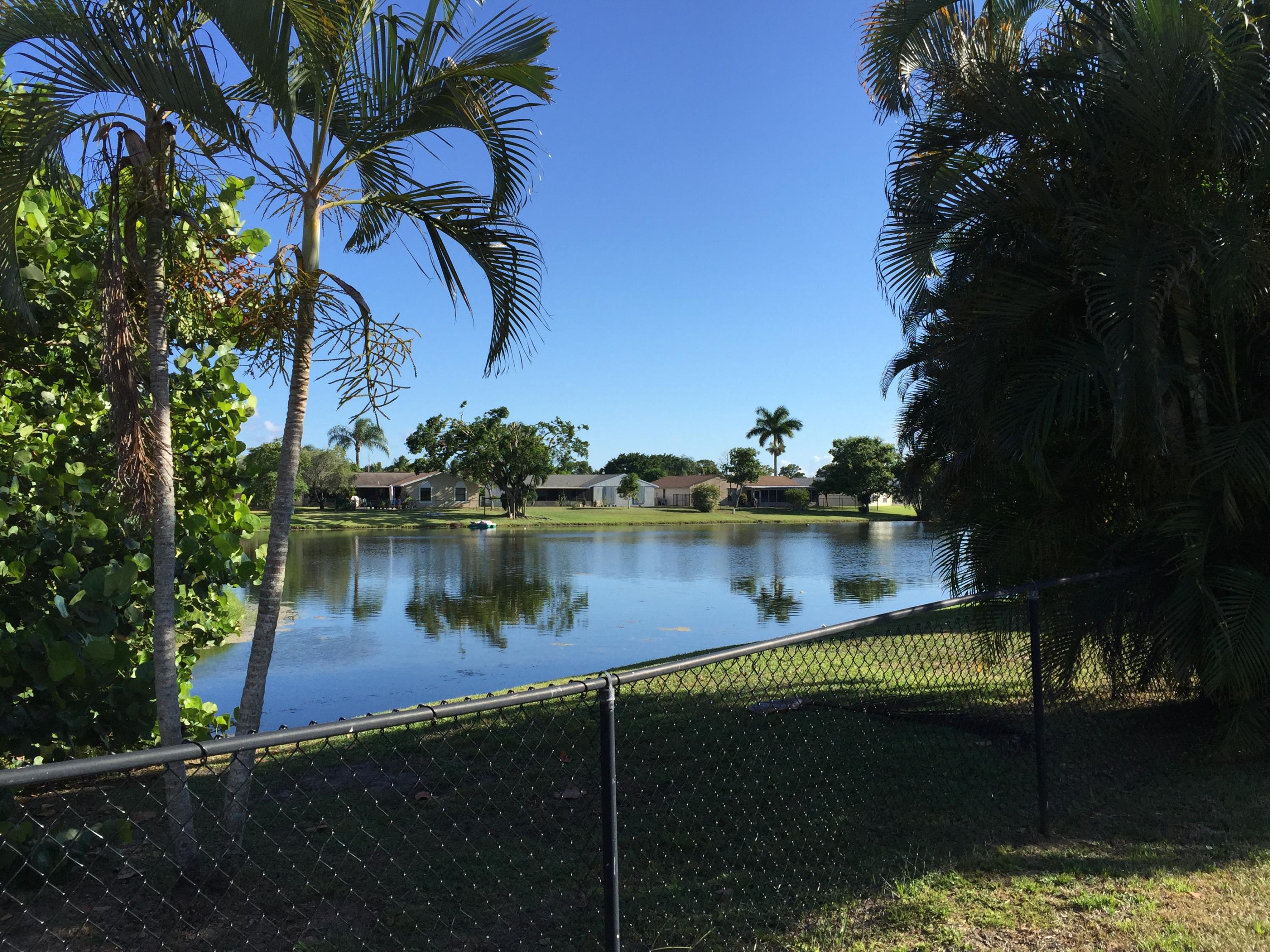 5266 Steven Road Boynton Beach, FL 33472 - Photo 2 of 26 a view of lake