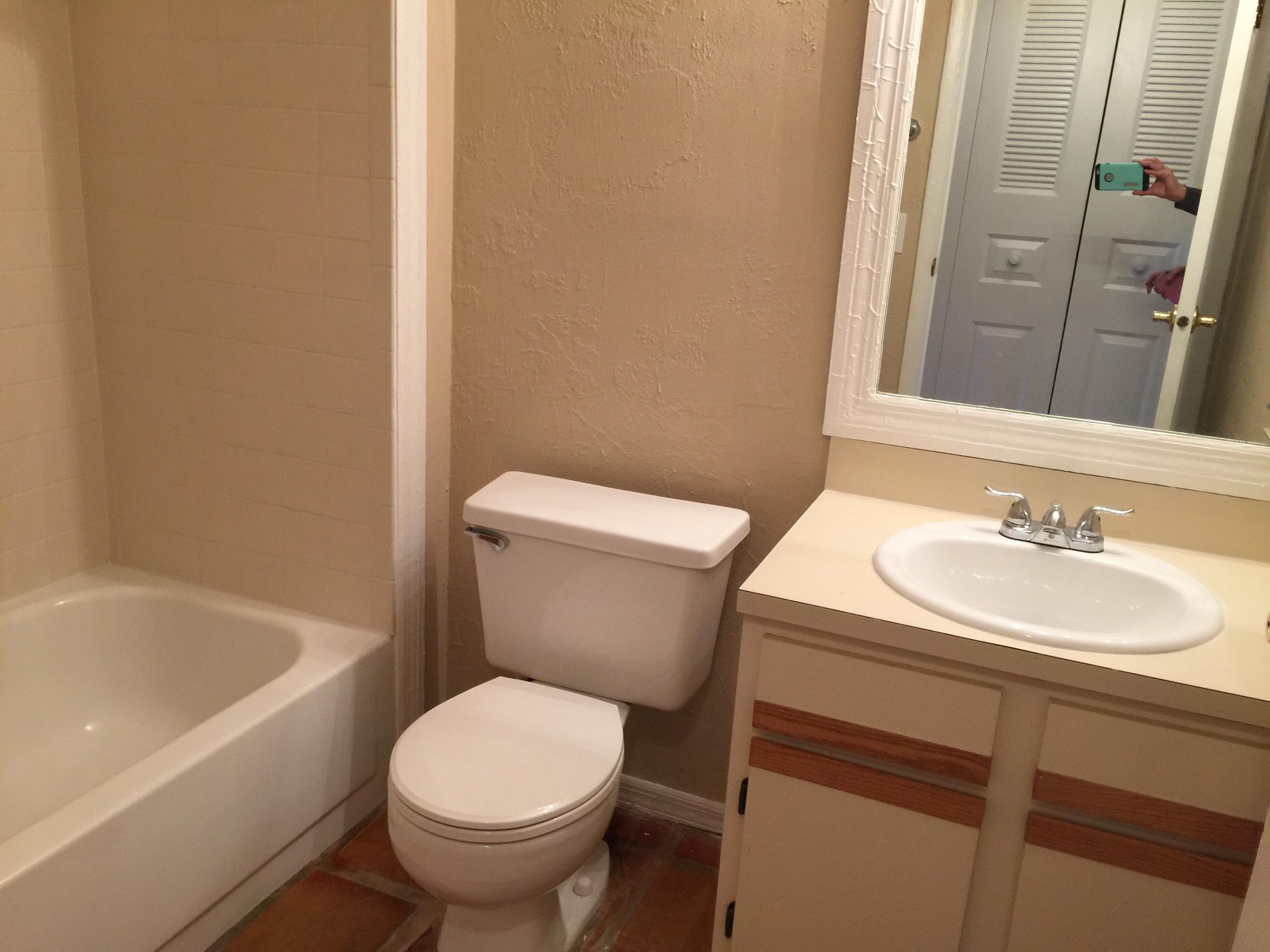 5266 Steven Road Boynton Beach, FL 33472 - Photo 21 of 26 a white toilet sitting next to a bathroom sink