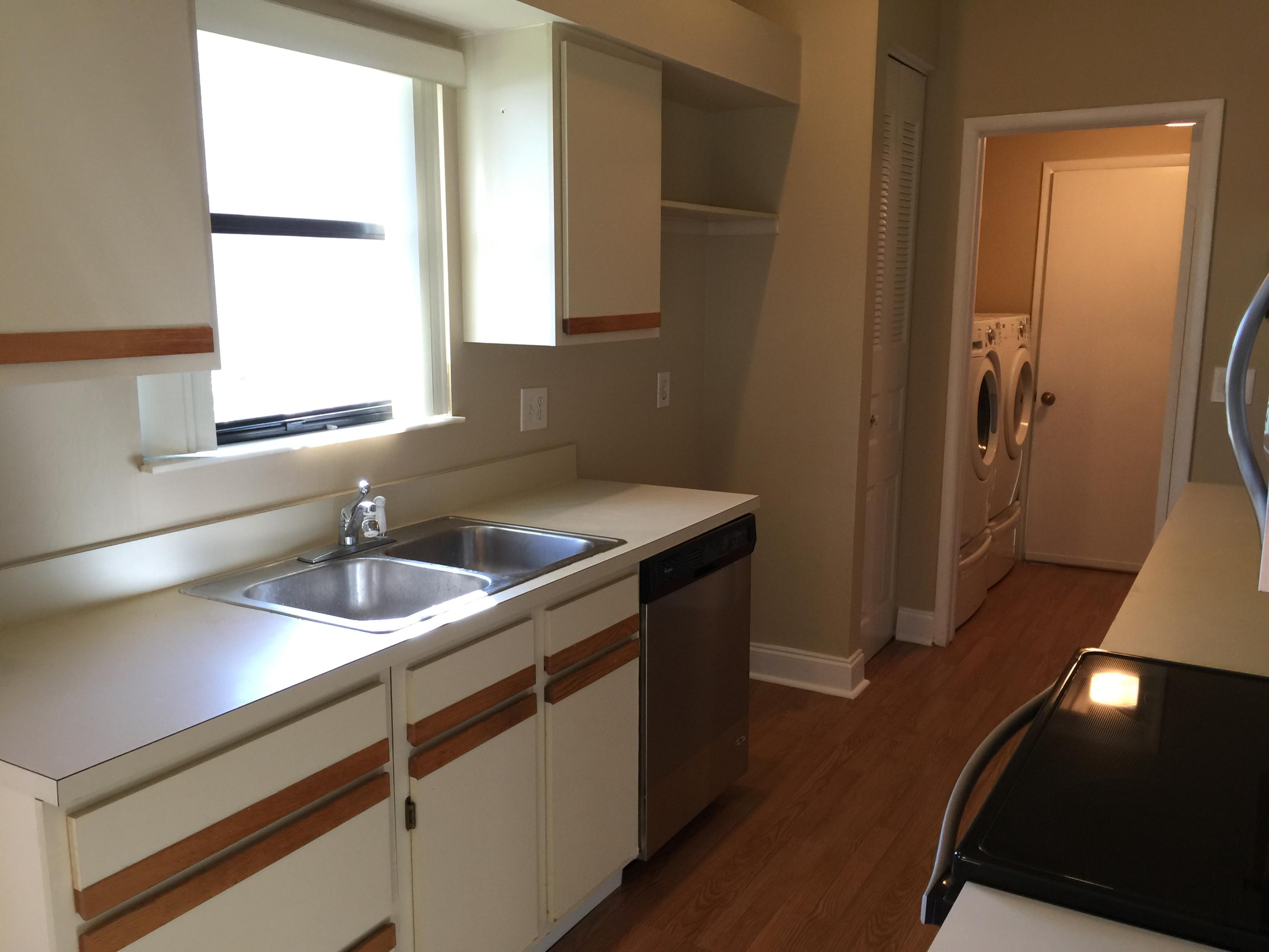 5266 Steven Road Boynton Beach, FL 33472 - Photo 8 of 26 a kitchen with a sink and a window