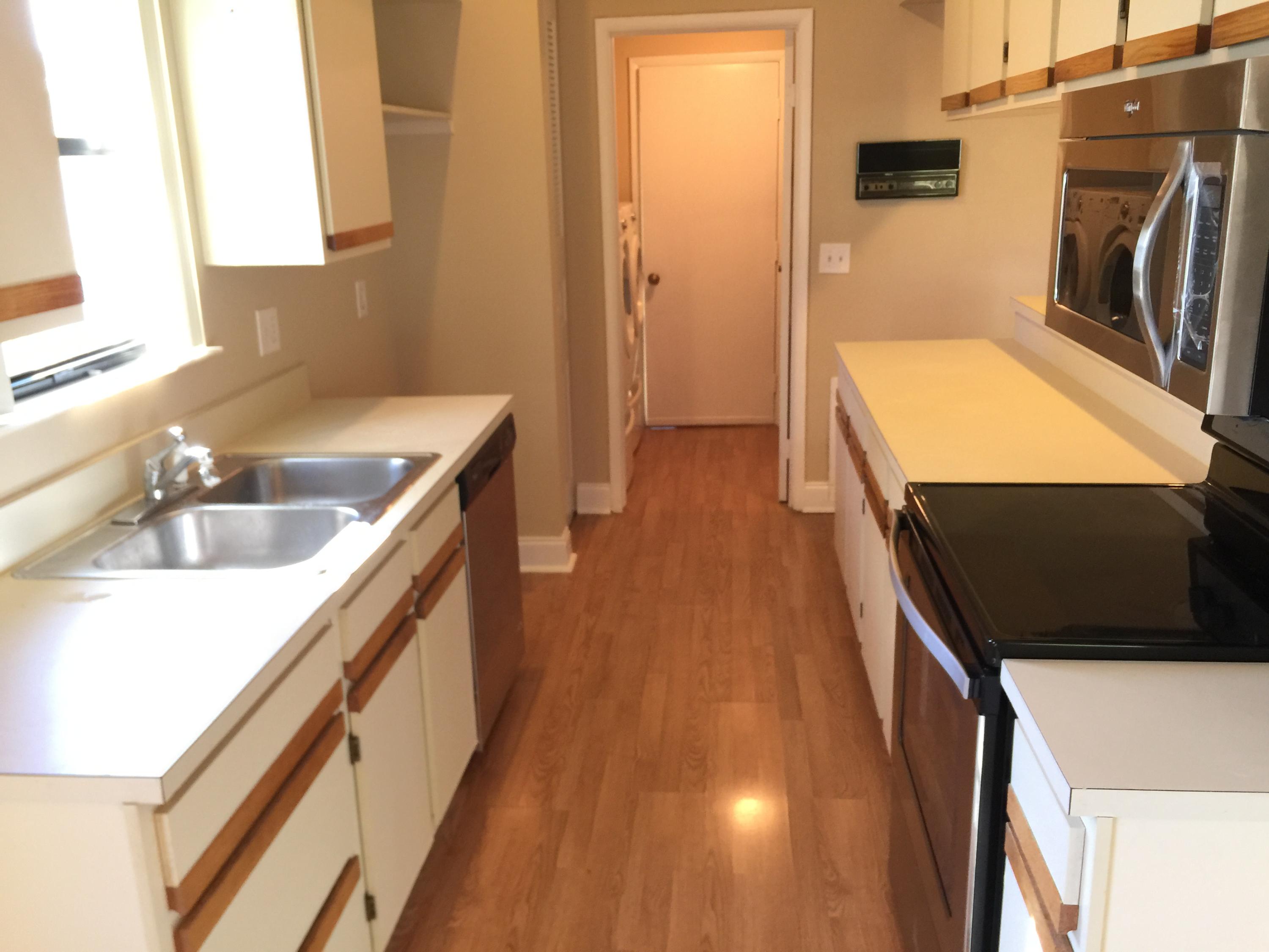 5266 Steven Road Boynton Beach, FL 33472 - Photo 10 of 26 a hallway with washer and dryer