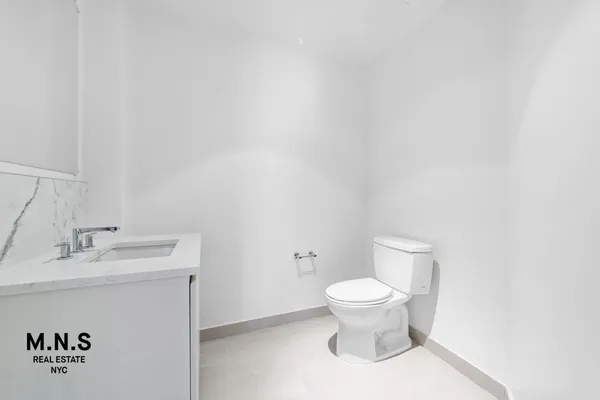 a bathroom with a sink a toilet and a bathtub