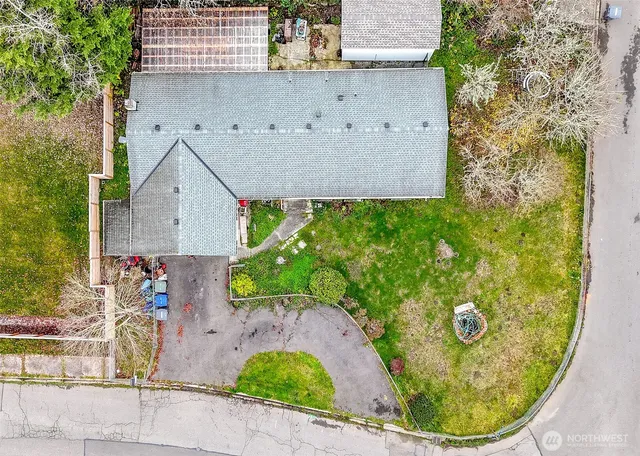front view of a house with a garden