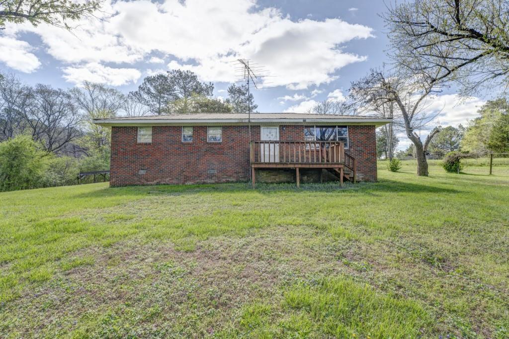 2988 Covington Bridge Road Southeast Fairmount, GA 30139 - Photo 1 of 1 a view of a house with a yard and sitting area