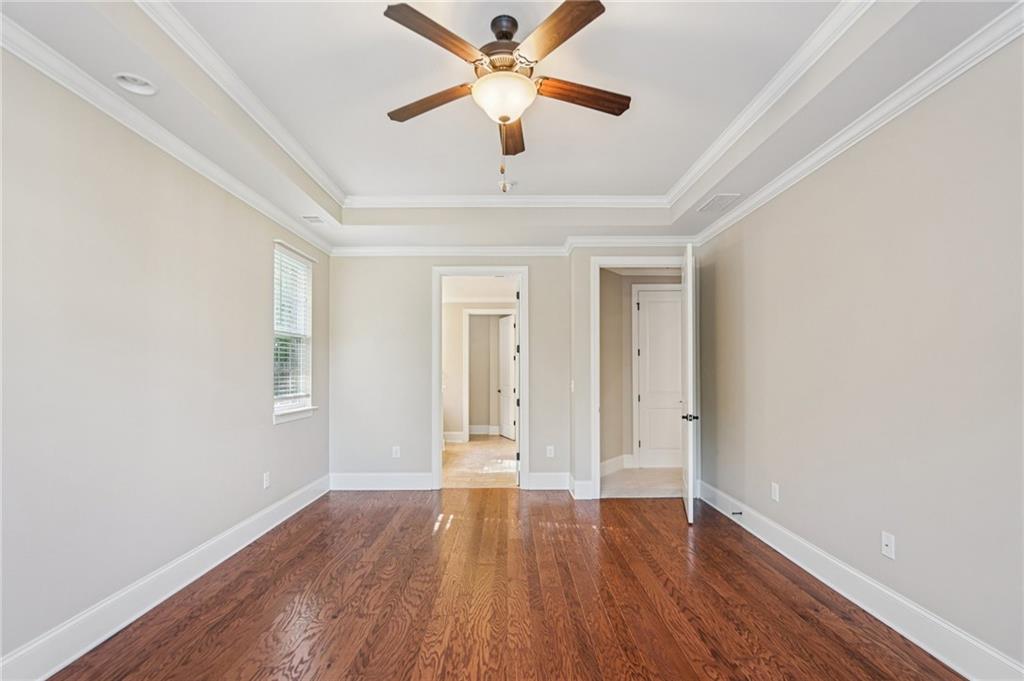 488 Townsend Street Grayson, GA 30017 - Photo 25 of 40 wooden floor in an empty room with a window