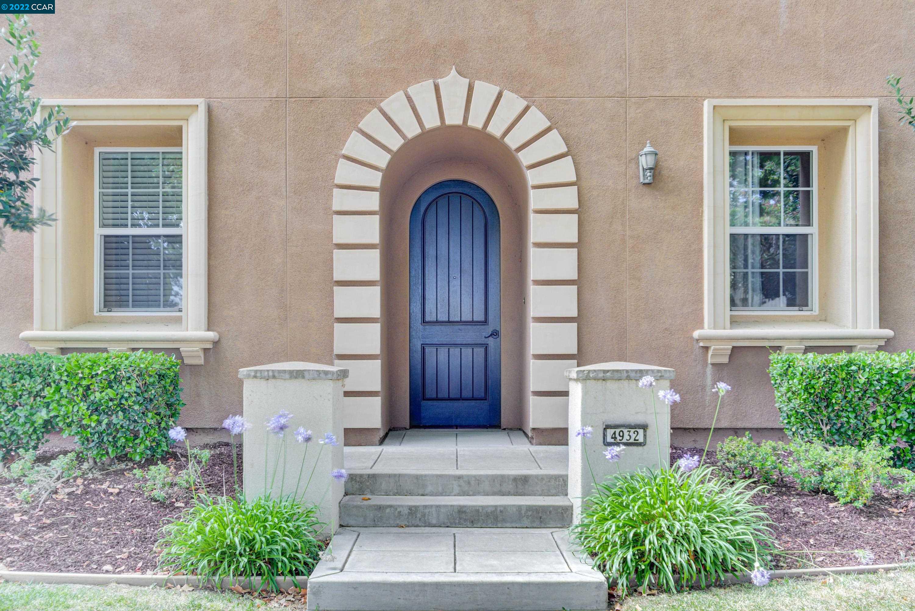 4932 Ivy Leaf Springs Road San Ramon, CA 94582 - Photo 1 of 1 a front view of a house with garden