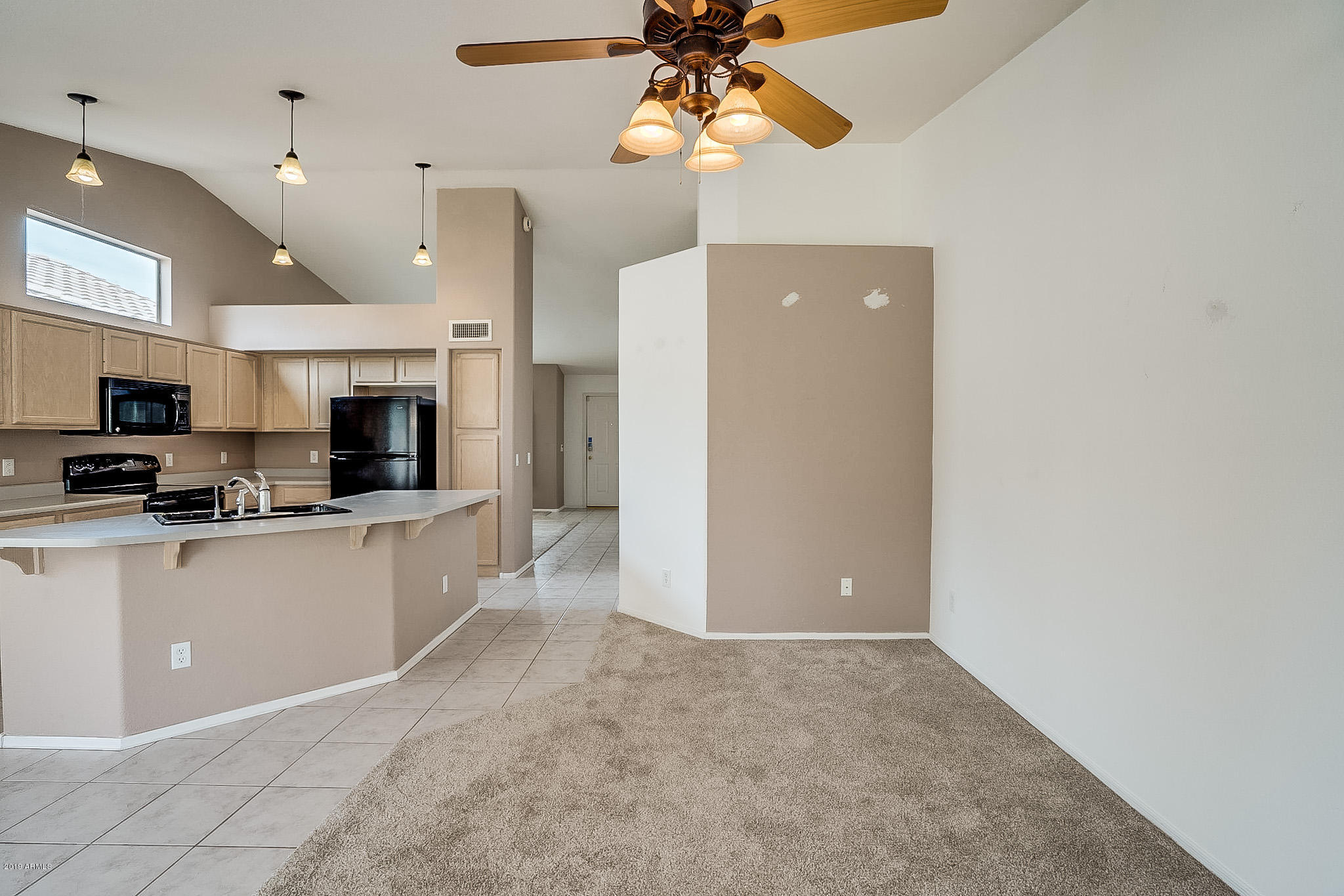 430 West Colt Road Tempe, AZ 85284 - Photo 3 of 18 a kitchen with stainless steel appliances a refrigerator and a microwave