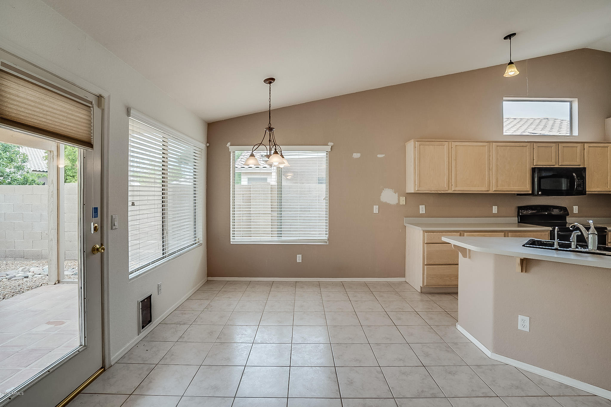 430 West Colt Road Tempe, AZ 85284 - Photo 7 of 18 a view of a kitchen with electric appliances