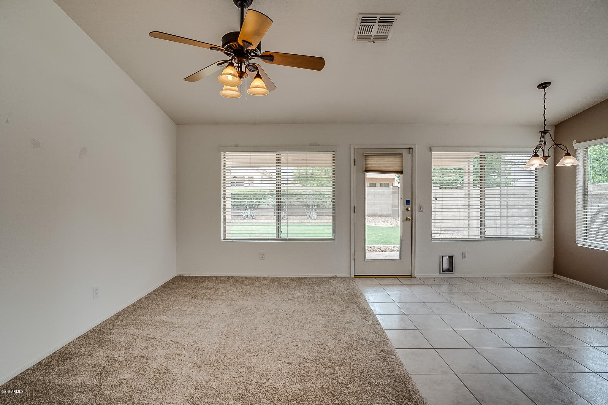 430 West Colt Road Tempe, AZ 85284 - Photo 8 of 18 a view of an empty room with a window