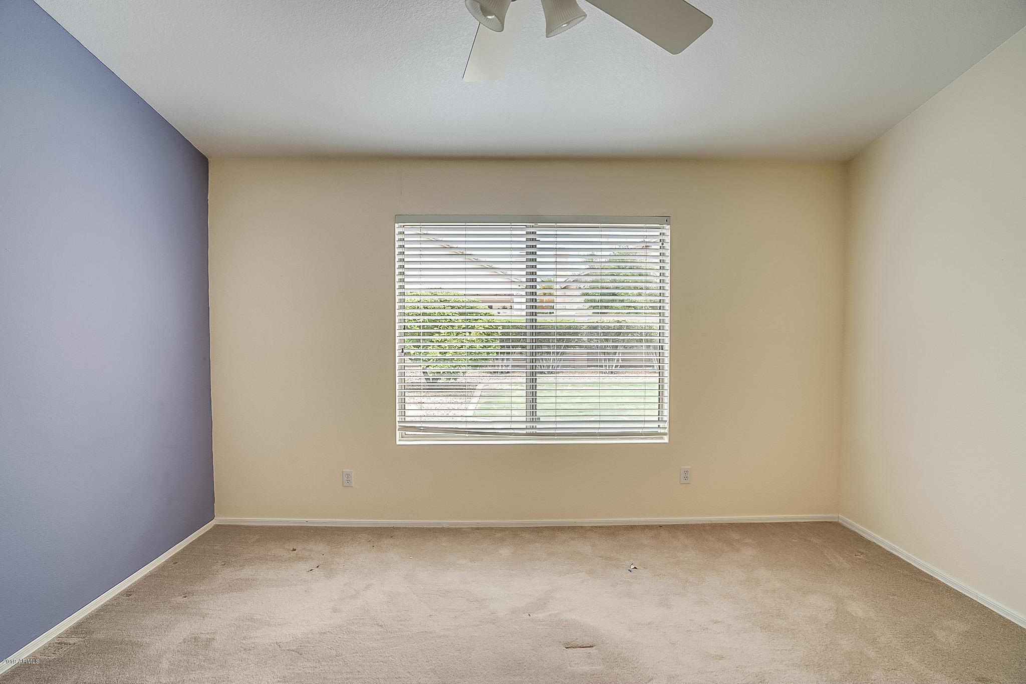 430 West Colt Road Tempe, AZ 85284 - Photo 10 of 18 an empty room with a window