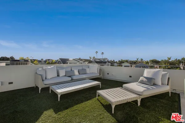 a view of a terrace with chairs
