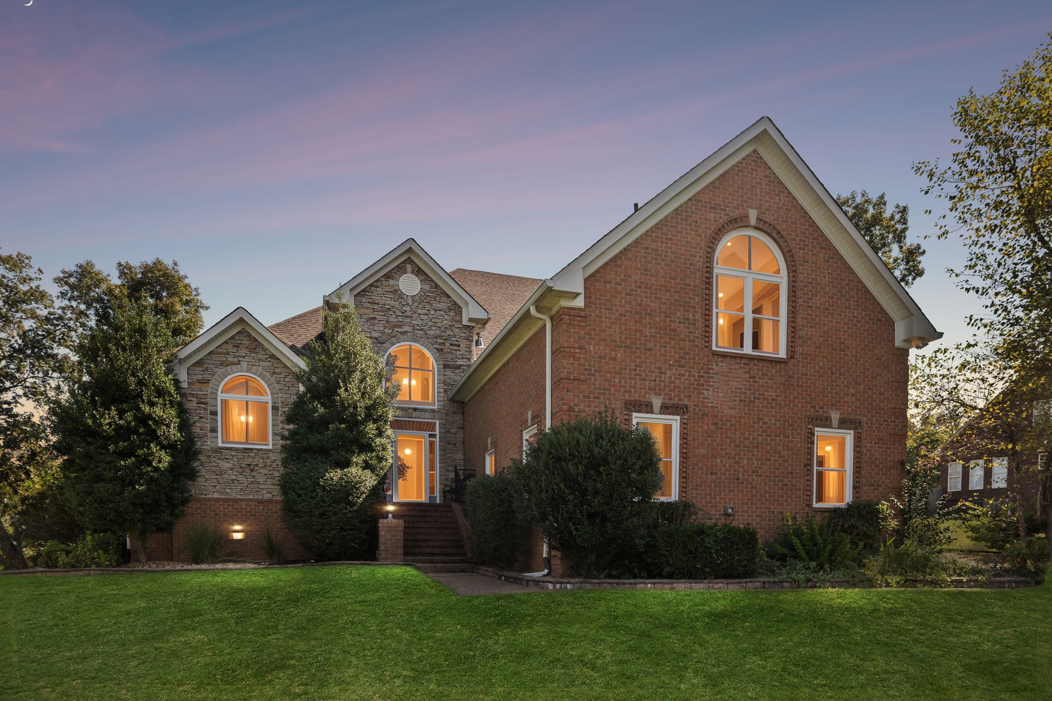 413 Stockbridge Way Mount Juliet, TN 37122 - Photo 2 of 49 a front view of house with garden