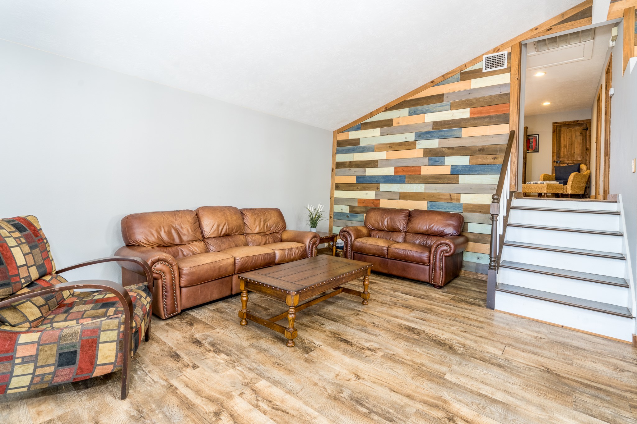 97 Greenway Drive Trinity, TX 75862 - Photo 16 of 49 a living room with furniture and a wooden floor