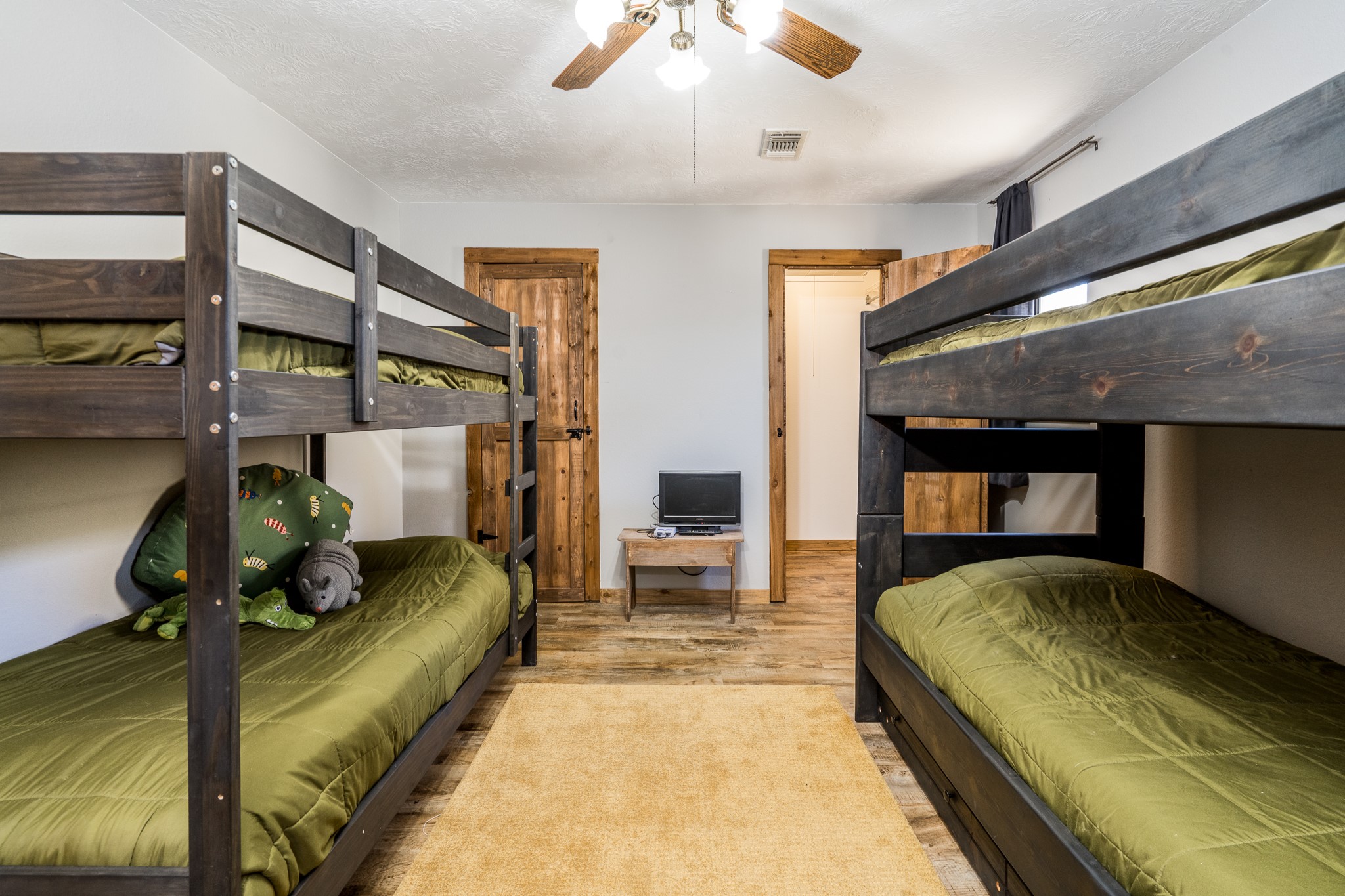 97 Greenway Drive Trinity, TX 75862 - Photo 25 of 49 a bedroom with furniture and a fireplace