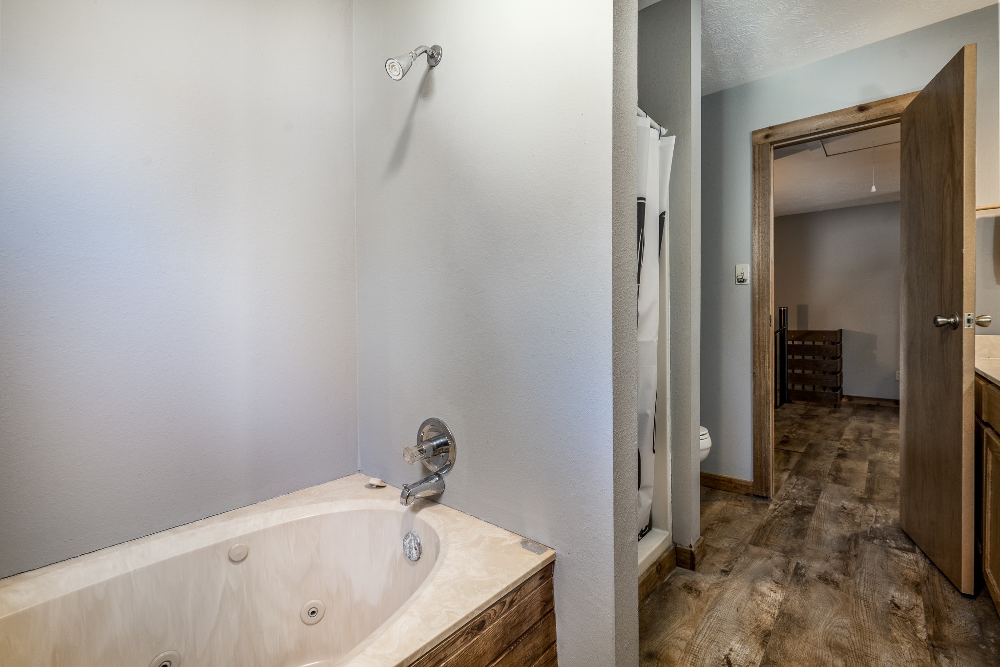 97 Greenway Drive Trinity, TX 75862 - Photo 27 of 49 a bathroom with a tub and a sink