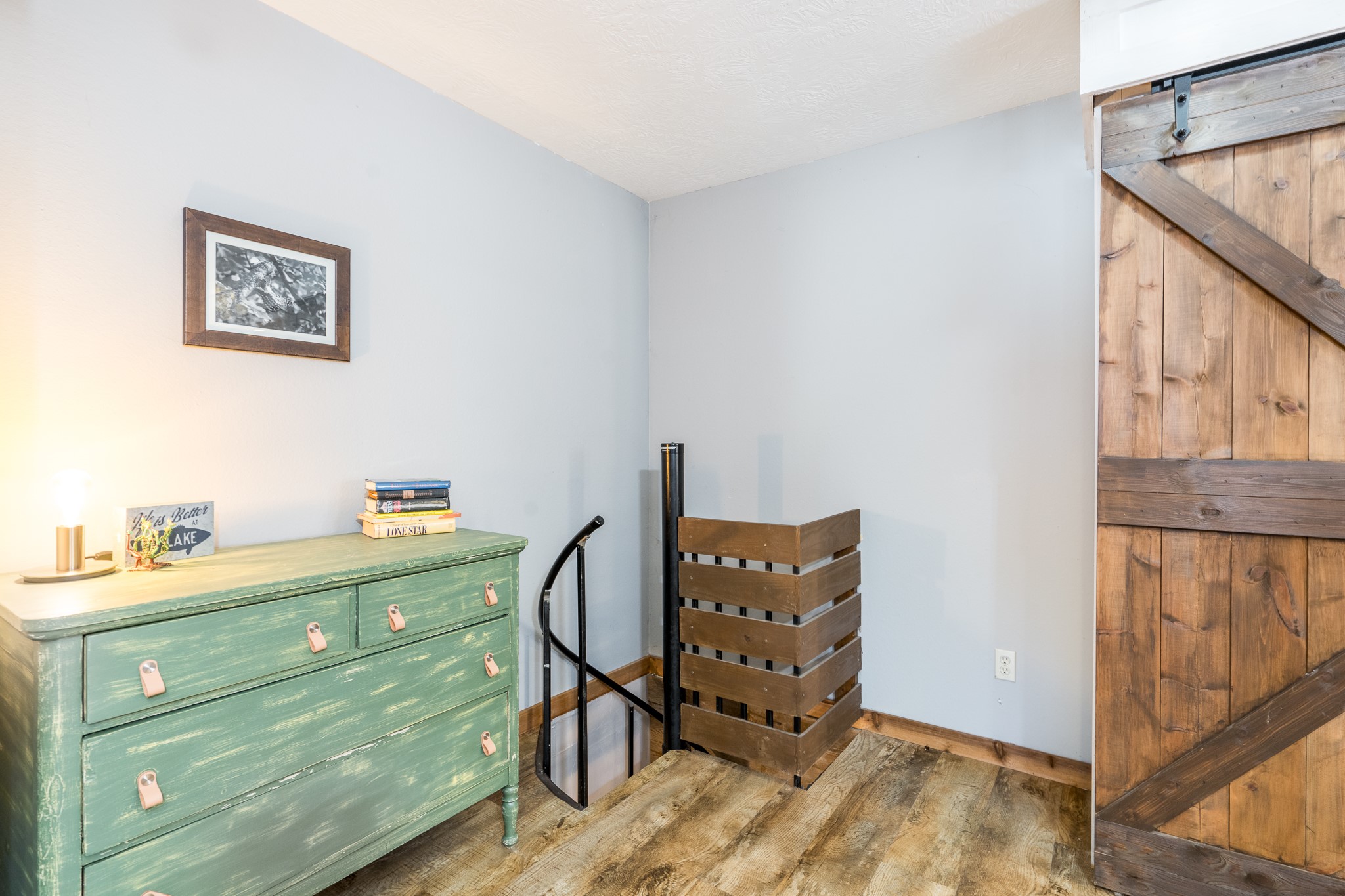 97 Greenway Drive Trinity, TX 75862 - Photo 29 of 49 a room with a baby crib and a dresser