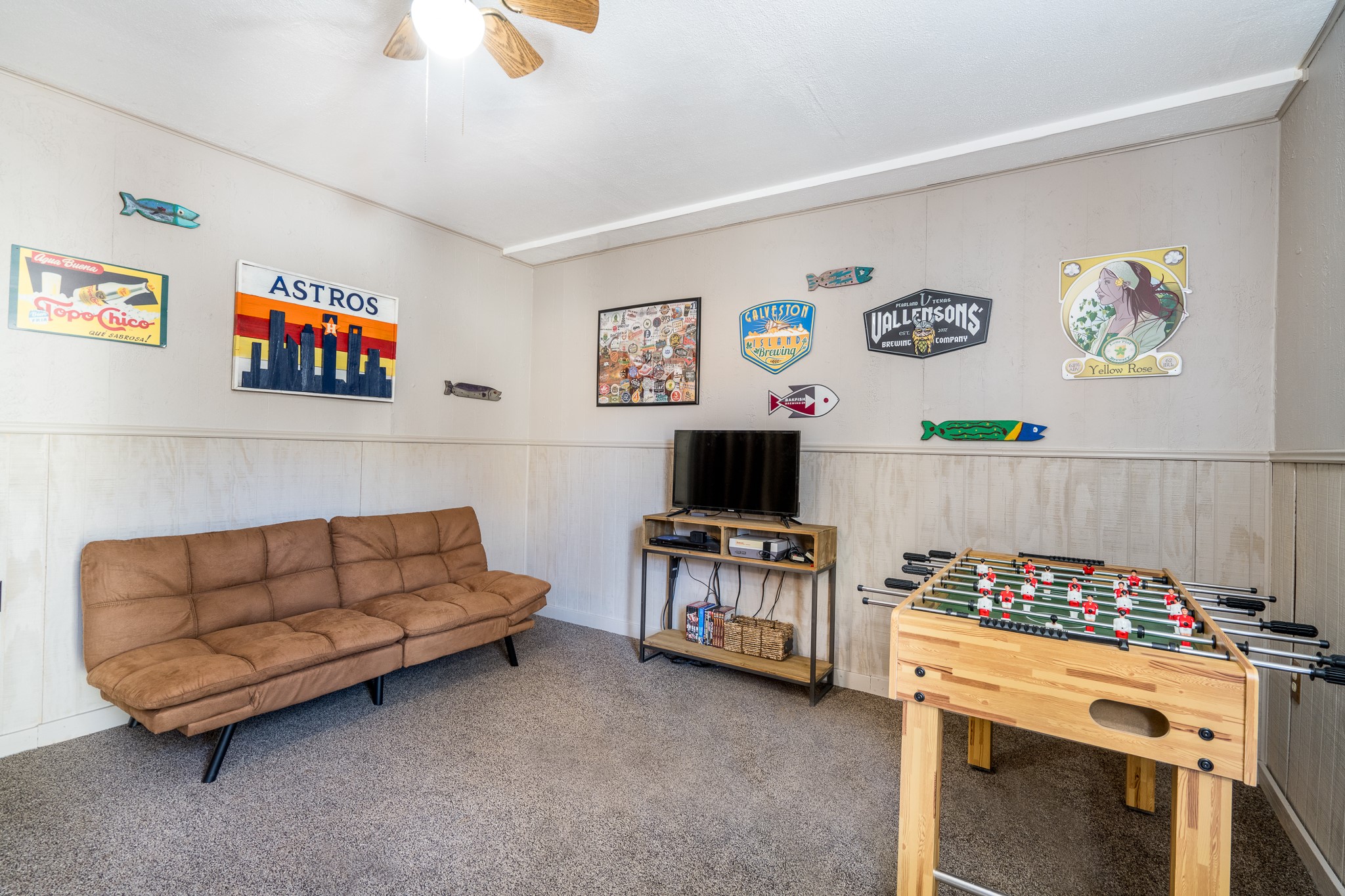 97 Greenway Drive Trinity, TX 75862 - Photo 32 of 49 a living room with furniture and a flat screen tv