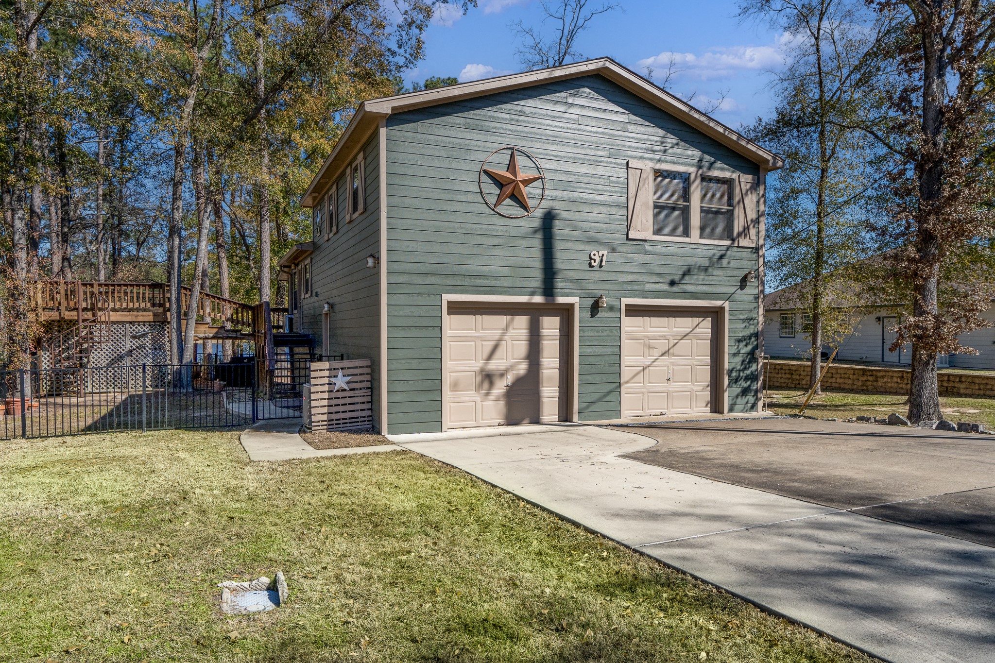 97 Greenway Drive Trinity, TX 75862 - Photo 49 of 49 a front view of a house with a yard