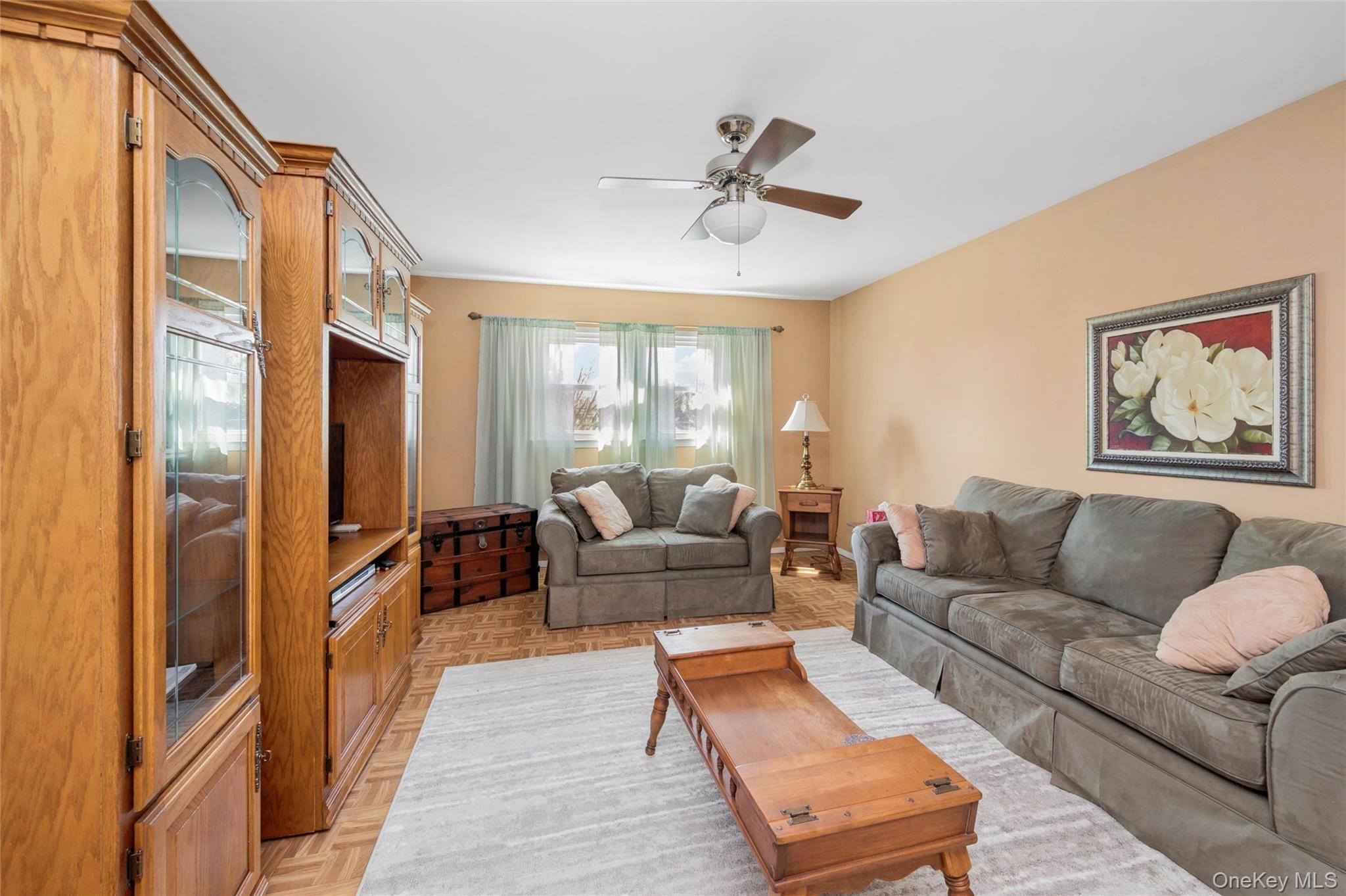 310 South 16th Street Lindenhurst, NY 11757 - Photo 10 of 23 a living room with furniture and a window
