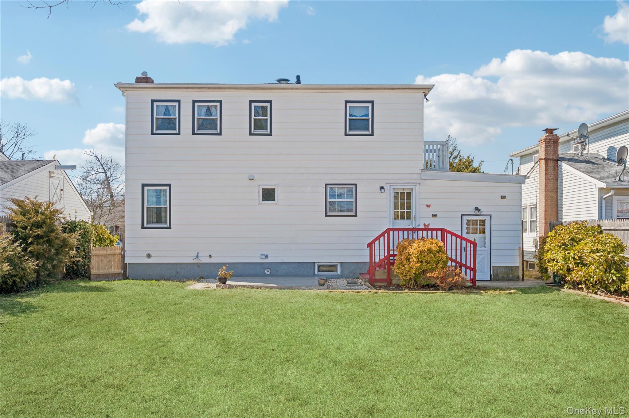 310 South 16th Street Lindenhurst, NY 11757 - Photo 16 of 23 a view of outdoor space yard and deck