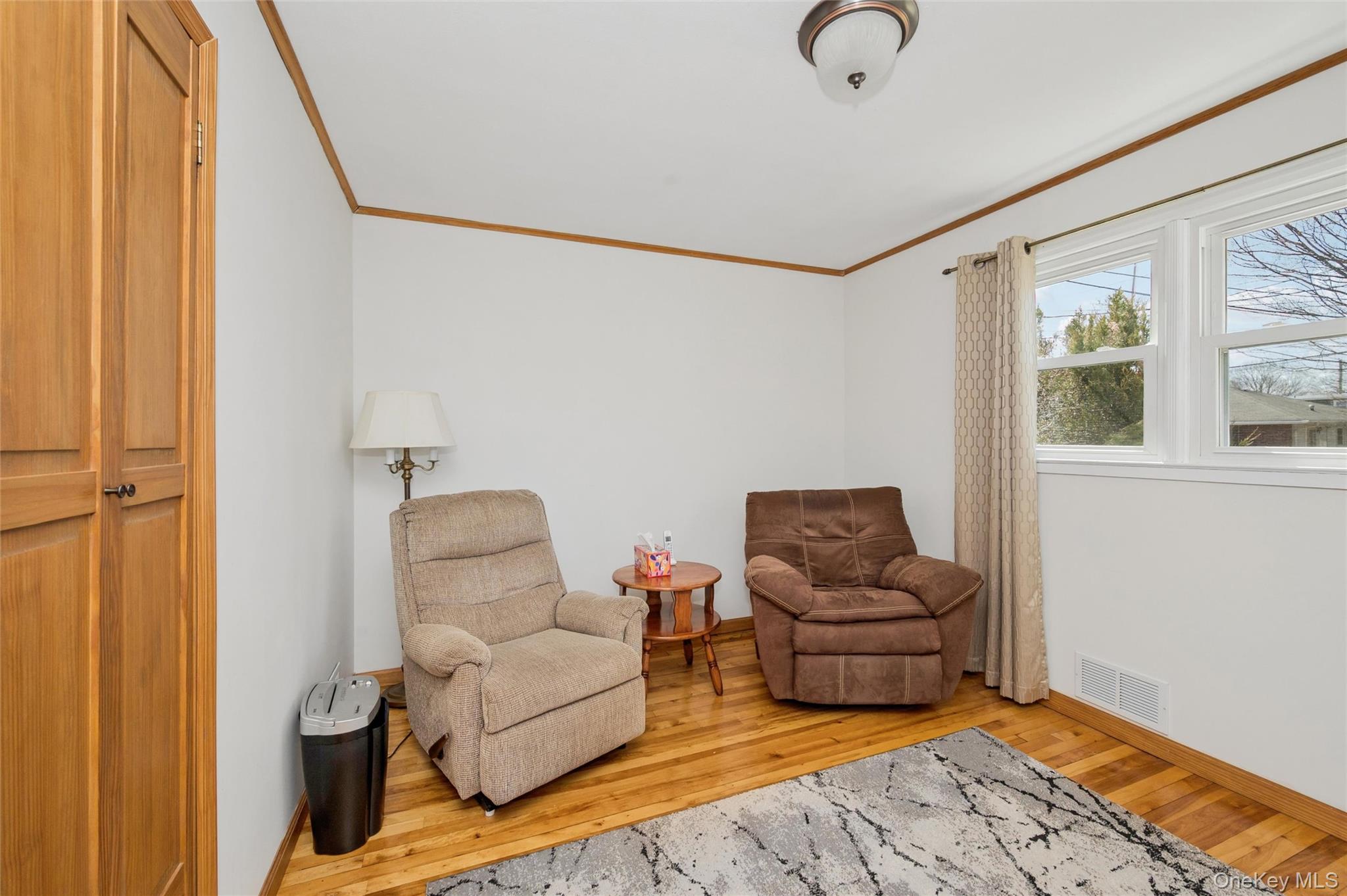 310 South 16th Street Lindenhurst, NY 11757 - Photo 8 of 23 a living room with furniture