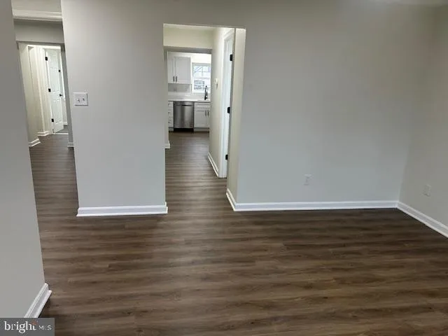 a kitchen with a refrigerator stove and microwave