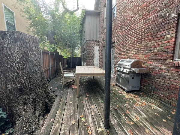 a view of a balcony with chairs