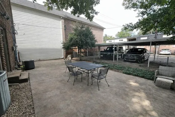 an outdoor view with patio