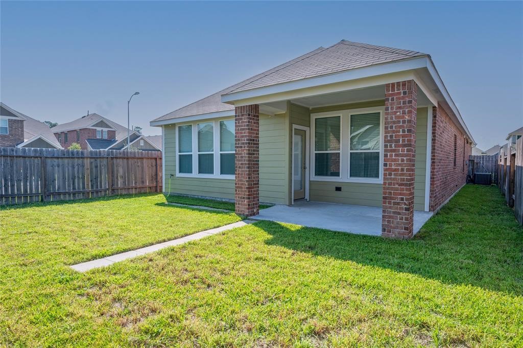 3137 Dunsmore Manor Court Spring, TX 77386 - Photo 6 of 32 cute covered patio nice setting for morning coffee outside!
