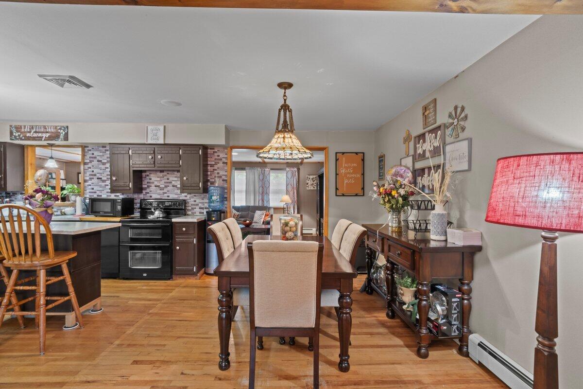 3315 Aspen Road Kunkletown, PA 18058 - Photo 15 of 32 a view of a dining room with furniture and chandelier