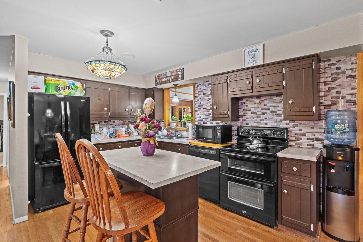 3315 Aspen Road Kunkletown, PA 18058 - Photo 18 of 32 a view of a dining room with furniture window and wooden floor