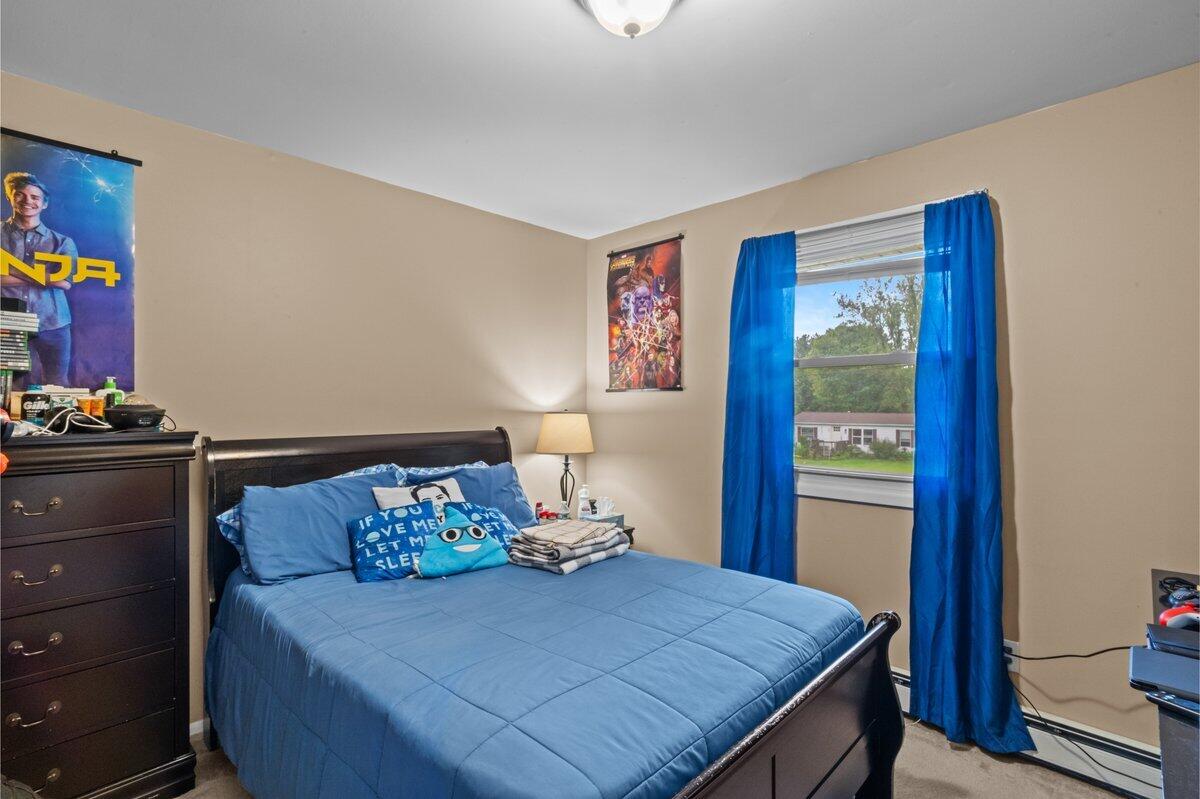 3315 Aspen Road Kunkletown, PA 18058 - Photo 25 of 32 a bedroom with a bed and wooden floor